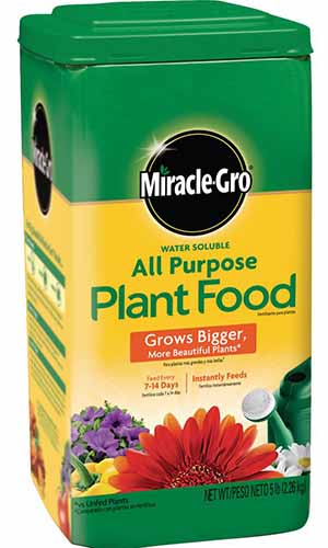 白色背景上的Miracle-Gro万能植物食品的包装特写。